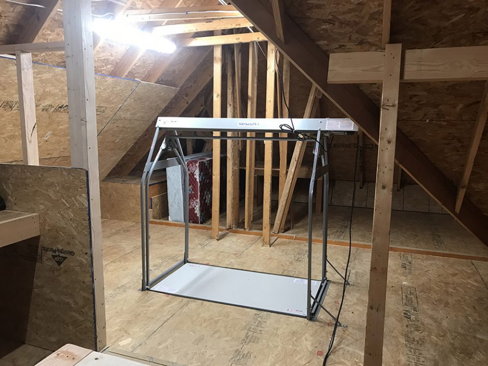 attic lift in an attic.